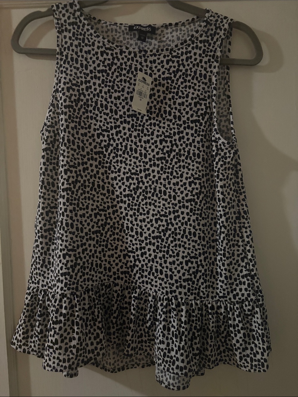 Express Black and White Sleeveless Ruffle-Hem Tunic